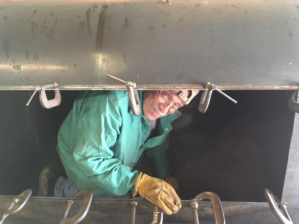 my step dad making the homemade smoker