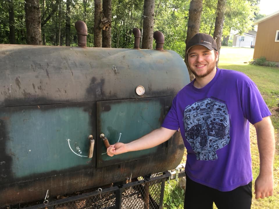 This is my son Josh with our homemade smoker