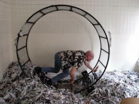 human running in circles on hamster wheel